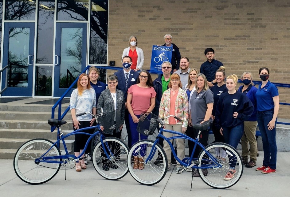 Colby United Methodist Church members pose with Bike Share in a Box bicycles.